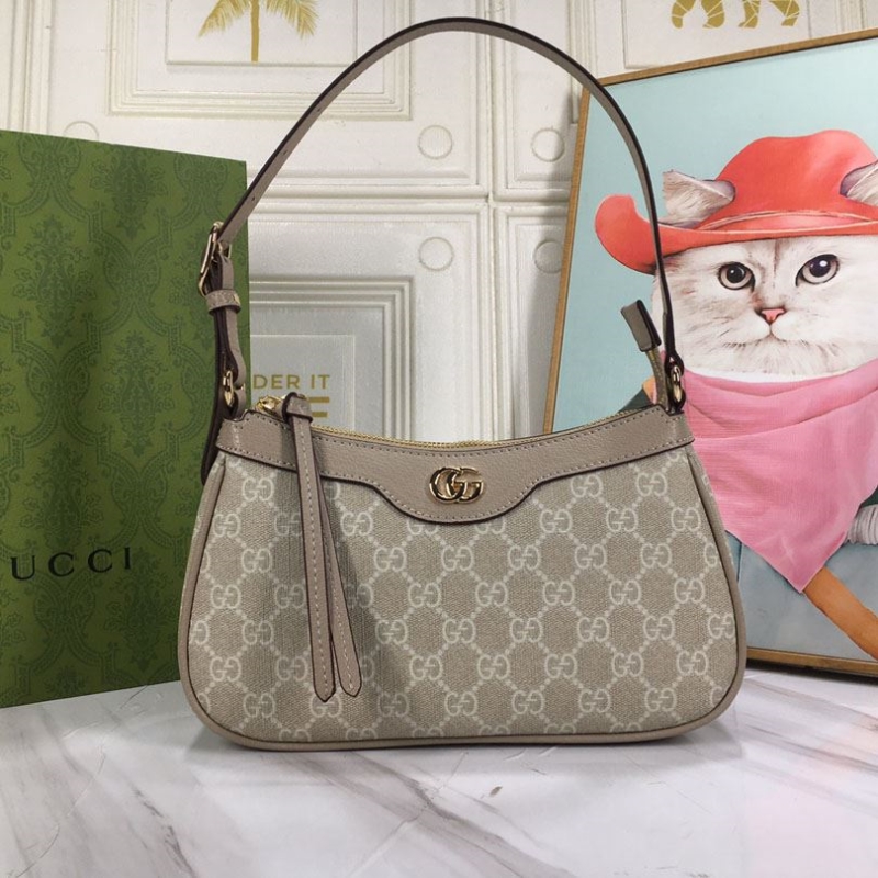 G*u*i top handle bags